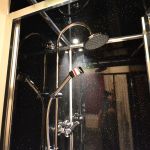 Single room's twin head power shower.