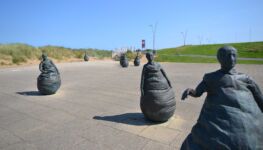 "Conversation Piece" - Public art by internationally famous sculptor Juan Muñoz close to Littlehaven Beach.