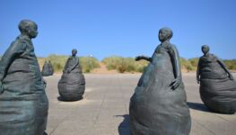 "Conversation Piece" - Public art by internationally famous sculptor Juan Muñoz close to Littlehaven Beach.